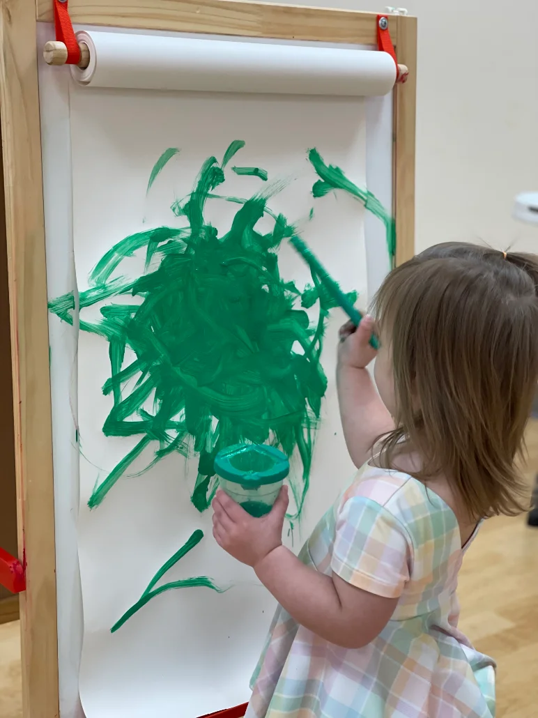Child exploring Montessori materials